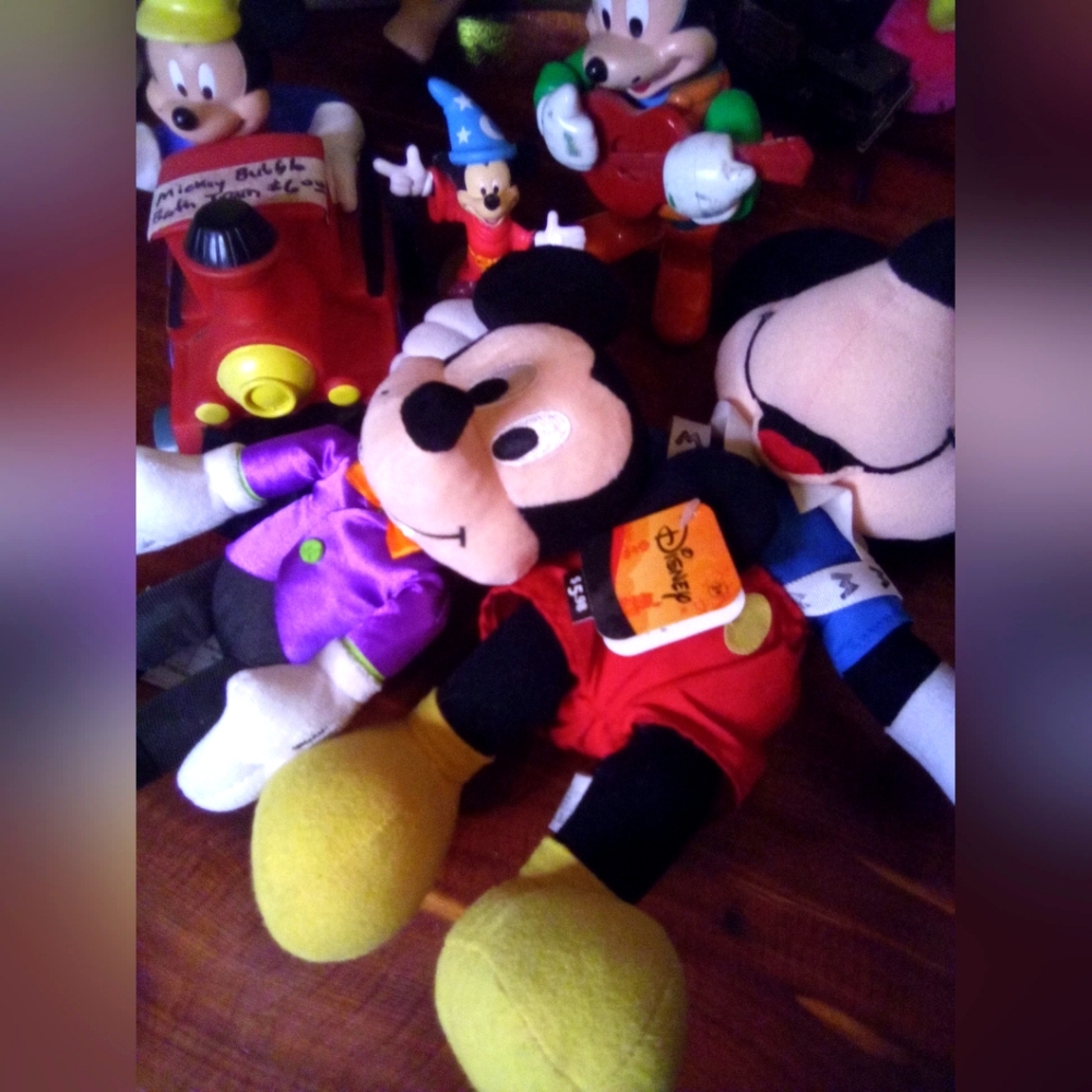 Mickey Mouse lot, Disney store, and vintage Mickey with others.